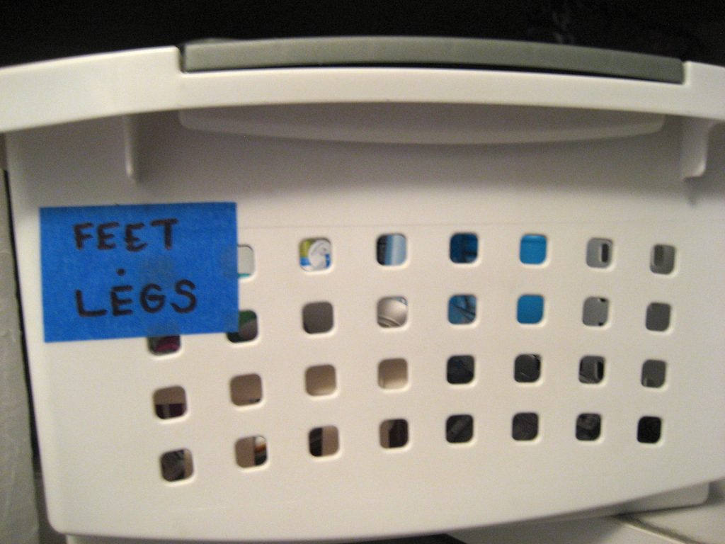 OCD toiletry drawer labeled Legs & Feet
