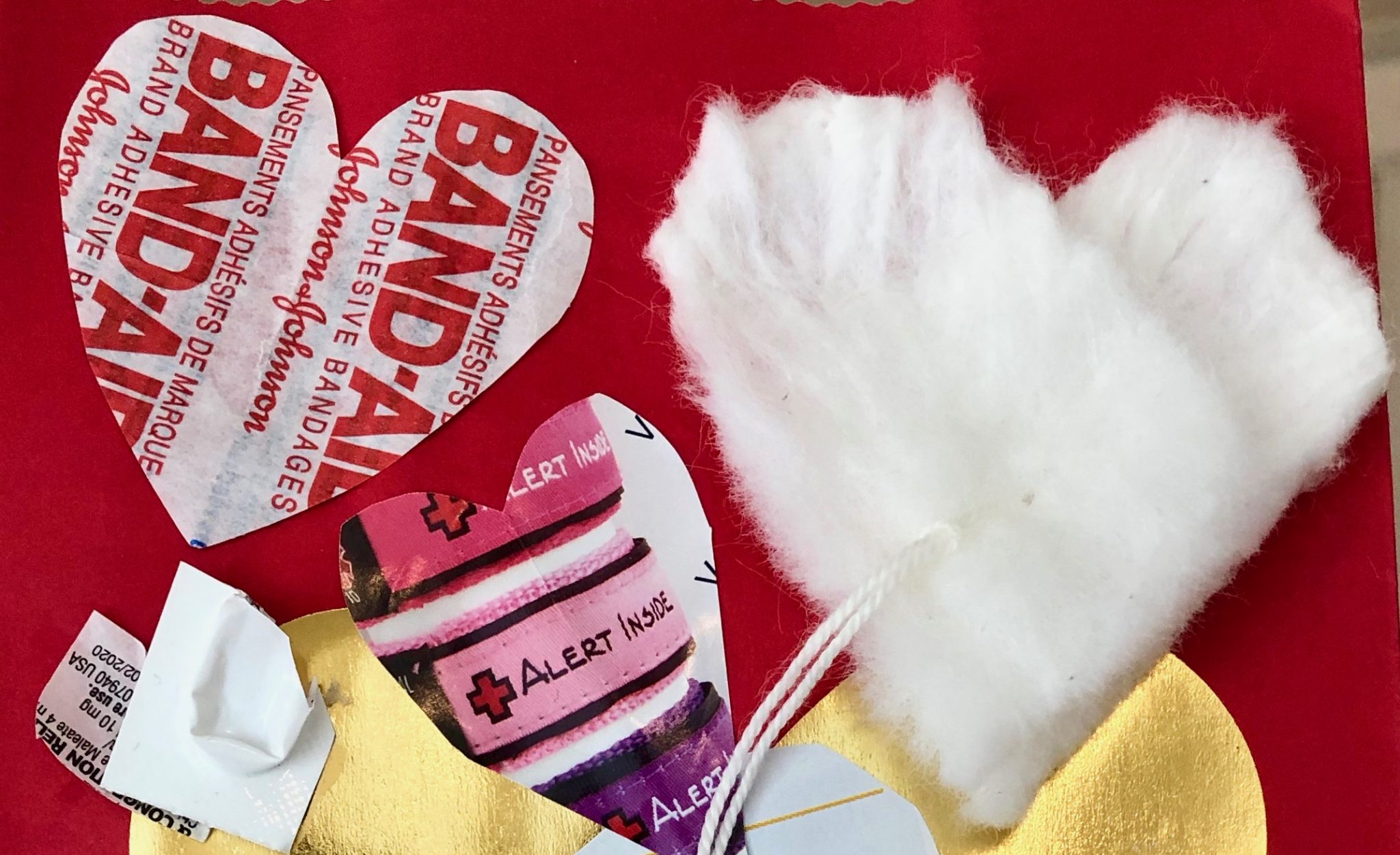 Honest valentine made from Band-aid wrappers & tampons